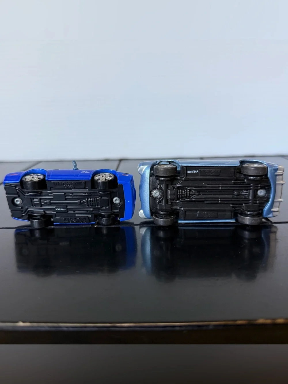 Disney Pixar Cars 2 Rod Torque Redline and Finn McMissile 1:55 diecast